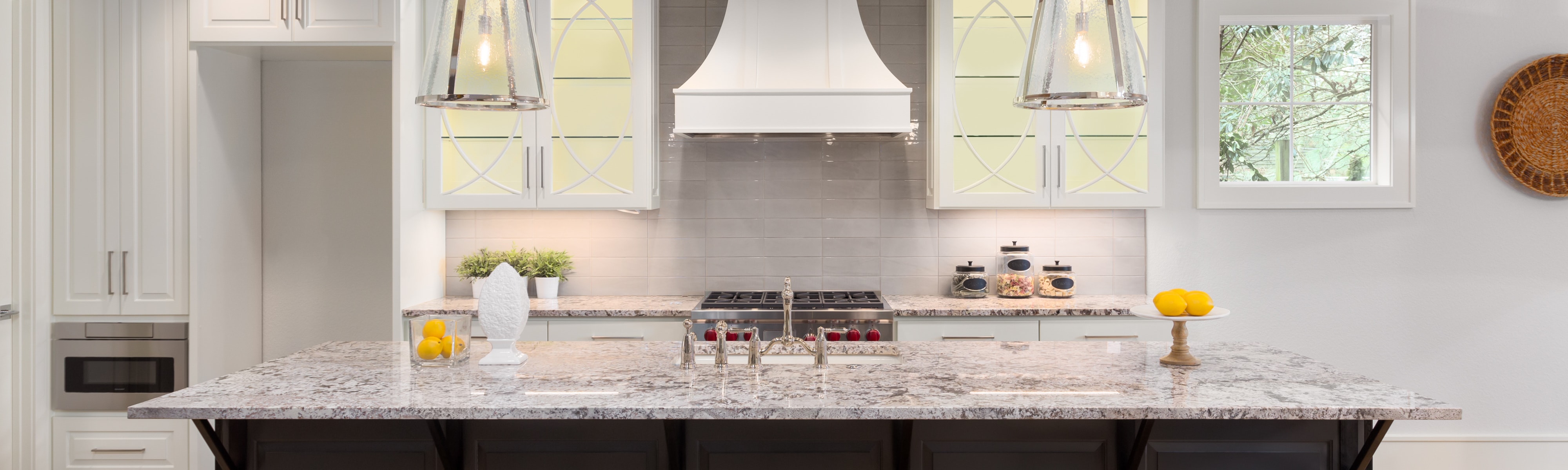 A nice looking kitchen in the afternoon.